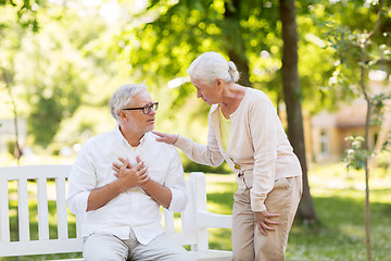 Image showing senior man feeling sick at summer park