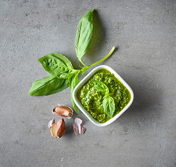 Image showing Pesto sauce on grey table