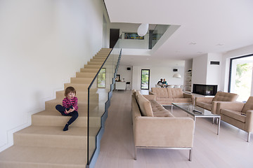 Image showing family with little girl enjoys in the modern living room