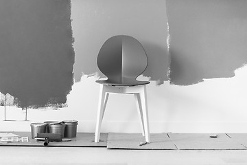 Image showing empty chair and equipment for painting