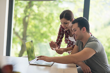 Image showing happy young couple buying online