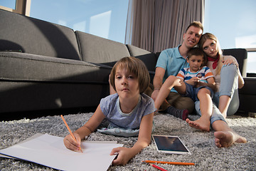 Image showing young couple spending time with kids