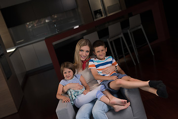 Image showing young mother spending time with kids