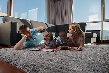 Image showing young couple spending time with kids