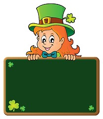 Image showing Leprechaun girl holding greenboard 1