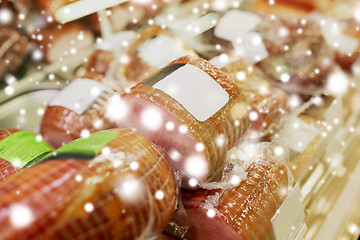 Image showing ham at grocery store stall