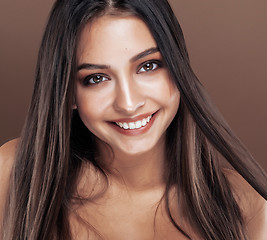 Image showing cute happy young indian woman in studio close up smiling, fashion mulatto smiling