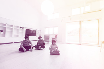 Image showing young boys having fun on the floor