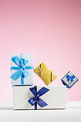 Image showing Gift box wrapped in recycled paper with ribbon bow