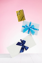 Image showing Gift box wrapped in recycled paper with ribbon bow