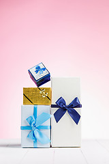 Image showing Gift box wrapped in recycled paper with ribbon bow