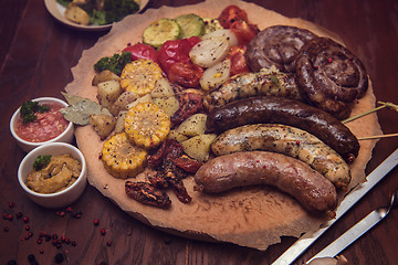 Image showing Grilled sausages with vegetables