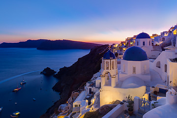 Image showing Traditional greek village of Oia at dusk, Santorini island, Greece.