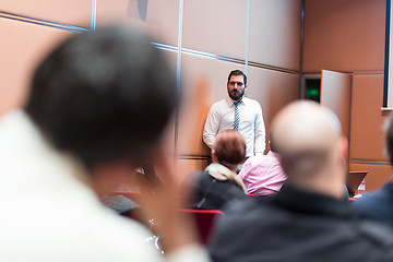 Image showing Speaker Giving a Talk at Business Meeting.