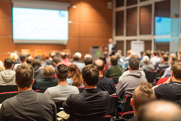 Image showing Business speaker giving a talk at business conference event.