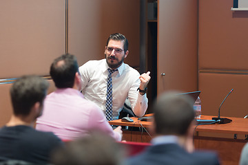 Image showing Speaker Giving a Talk at Business Meeting.