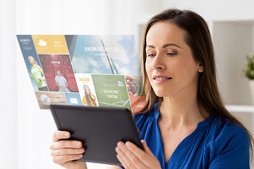 Image showing woman with tablet pc working at home or office