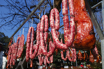 Image showing The meat drying outside on the sun