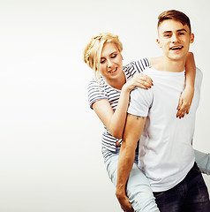 Image showing young pretty teenage couple, hipster guy with his girlfriend hap