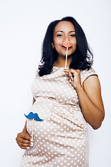 Image showing young pretty african american woman pregnant happy smiling, posing on white background isolated , lifestyle people concept