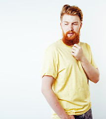 Image showing young handsome hipster ginger bearded guy looking brutal isolate