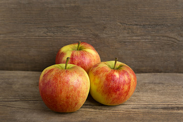 Image showing Healthy apples on wooden background