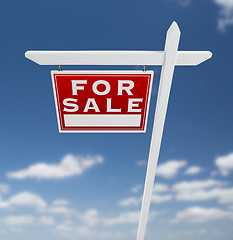 Image showing Left Facing For Sale Real Estate Sign on a Blue Sky with Clouds.