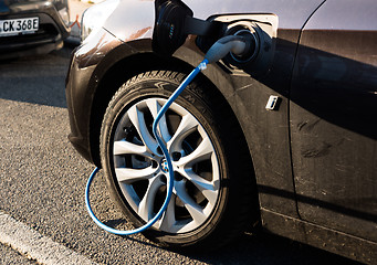 Image showing BMW i electric car being charged