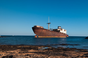 Image showing Old rusty boat stranded on the shore in Lanzarote, Canary Island