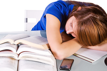 Image showing College Student Sleeping on her Desk