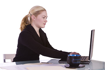 Image showing Businesswoman at Her Desk Working