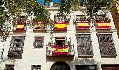 Image showing The national flags of Spain hang on the balcony