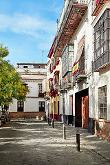 Image showing The national flags of Spain hang on the balcony