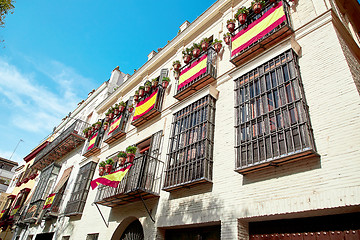 Image showing The national flags of Spain hang on the balcony