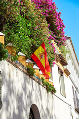 Image showing The national flag of Spain hang on the balcony