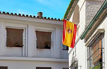 Image showing The national flag of Spain hang on the balcony