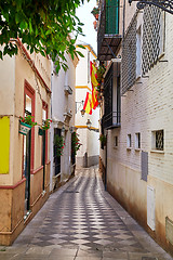 Image showing The national flag of Spain hang on the balcony