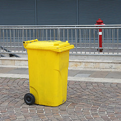 Image showing Yellow Wheelie Bin