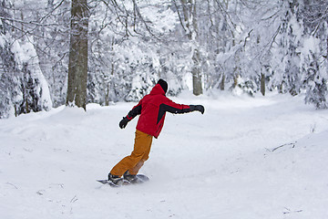 Image showing Winter sport snowboarder at ski slopeand alps mountains landscap