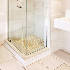 Image showing Modern shower with tiled walls and floor