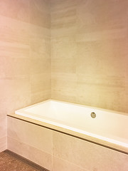 Image showing Renovated bathroom with ceramic tile walls