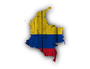 Image showing Map and flag of Colombia on weathered wood