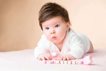 Image showing Bright blue eyed 6 month old baby girl