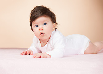 Image showing Bright blue eyed 6 month old baby girl