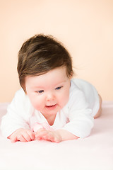 Image showing Bright blue eyed 6 month old baby girl