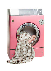 Image showing Portrait of an newborn in a washing machine