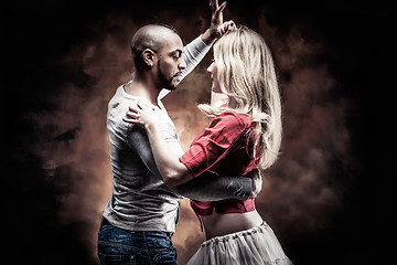 Image showing Young couple dances Caribbean Salsa