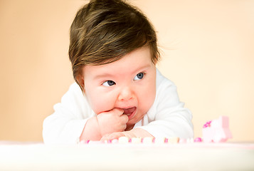 Image showing Bright blue eyed 6 month old baby girl