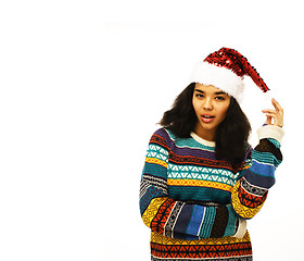 Image showing cute young girl in santas red hat isolated