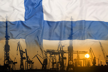 Image showing Industrial concept with Finland flag at sunset